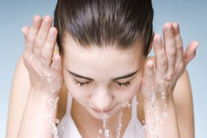 washing face royalty free image 1591887696